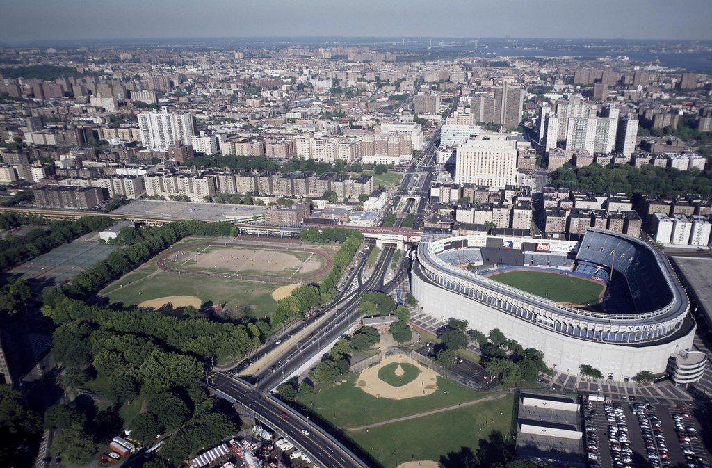 Aerial view of NFL stadium with full crowd during regular season game